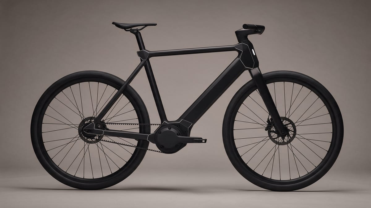 The bike — side profile, Graphite (the master render)