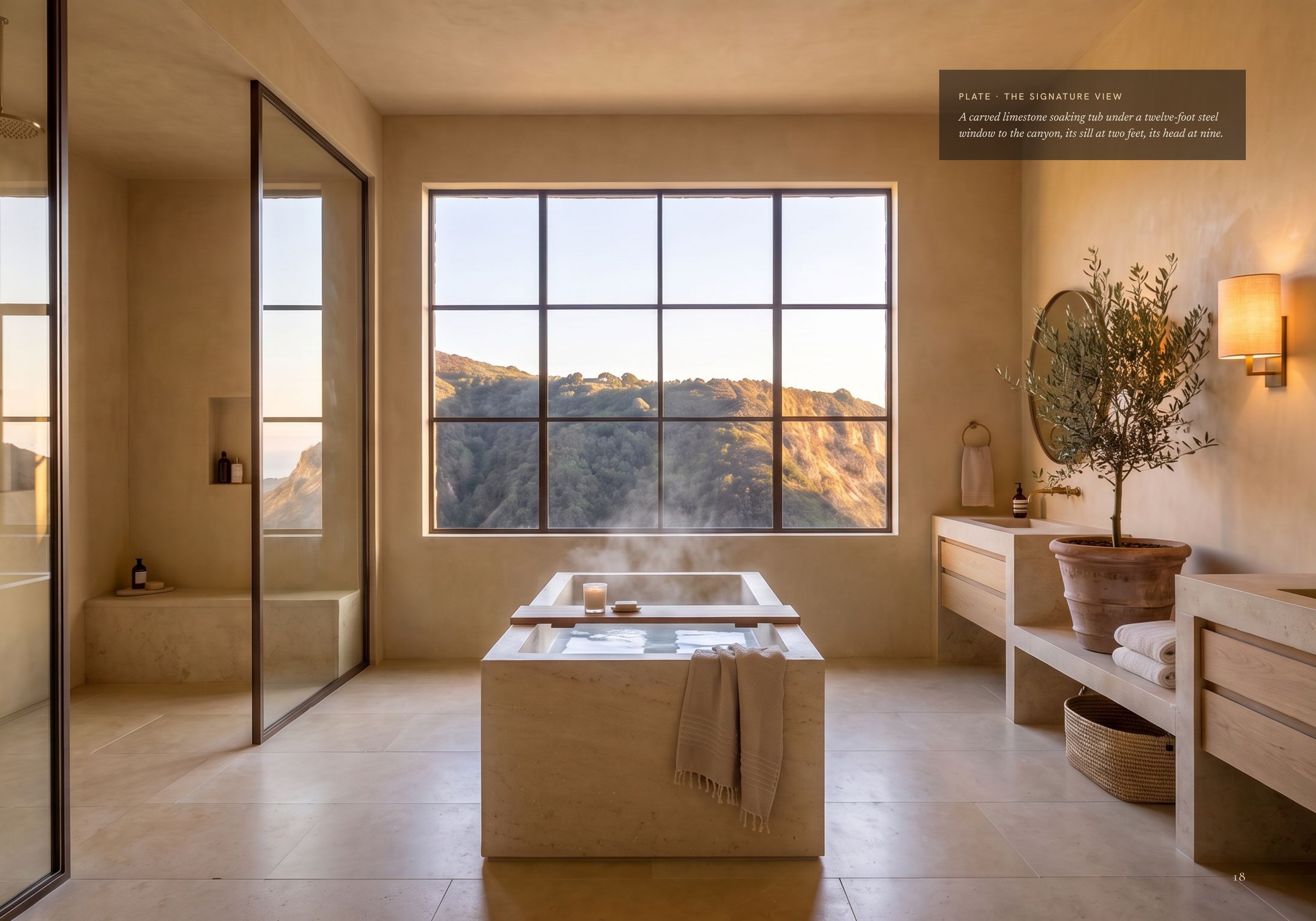 P L AT E · T H E S I G N AT U R E V I E W A carved limestone soaking tub under a twelve-foot steel window to the canyon, its sill at two feet, its head at nine. 18