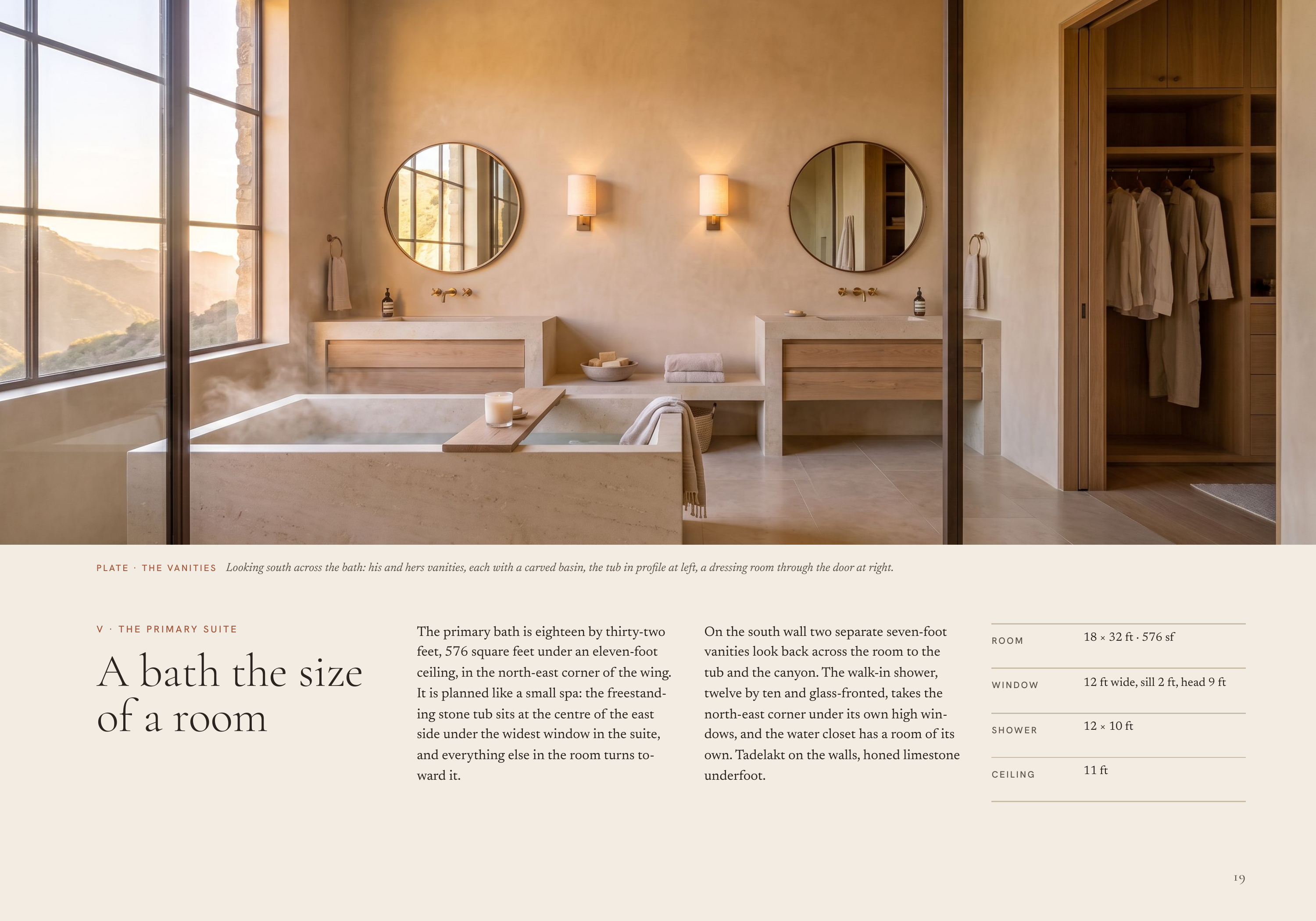 P L AT E · T H E VA N I T I E S Looking south across the bath: his and hers vanities, each with a carved basin, the tub in profile at left, a dressing room through the door at right. V · THE PRIMARY SUITE A bath the size of a room The primary bath is eighteen by thirty-two feet, 576 square feet…